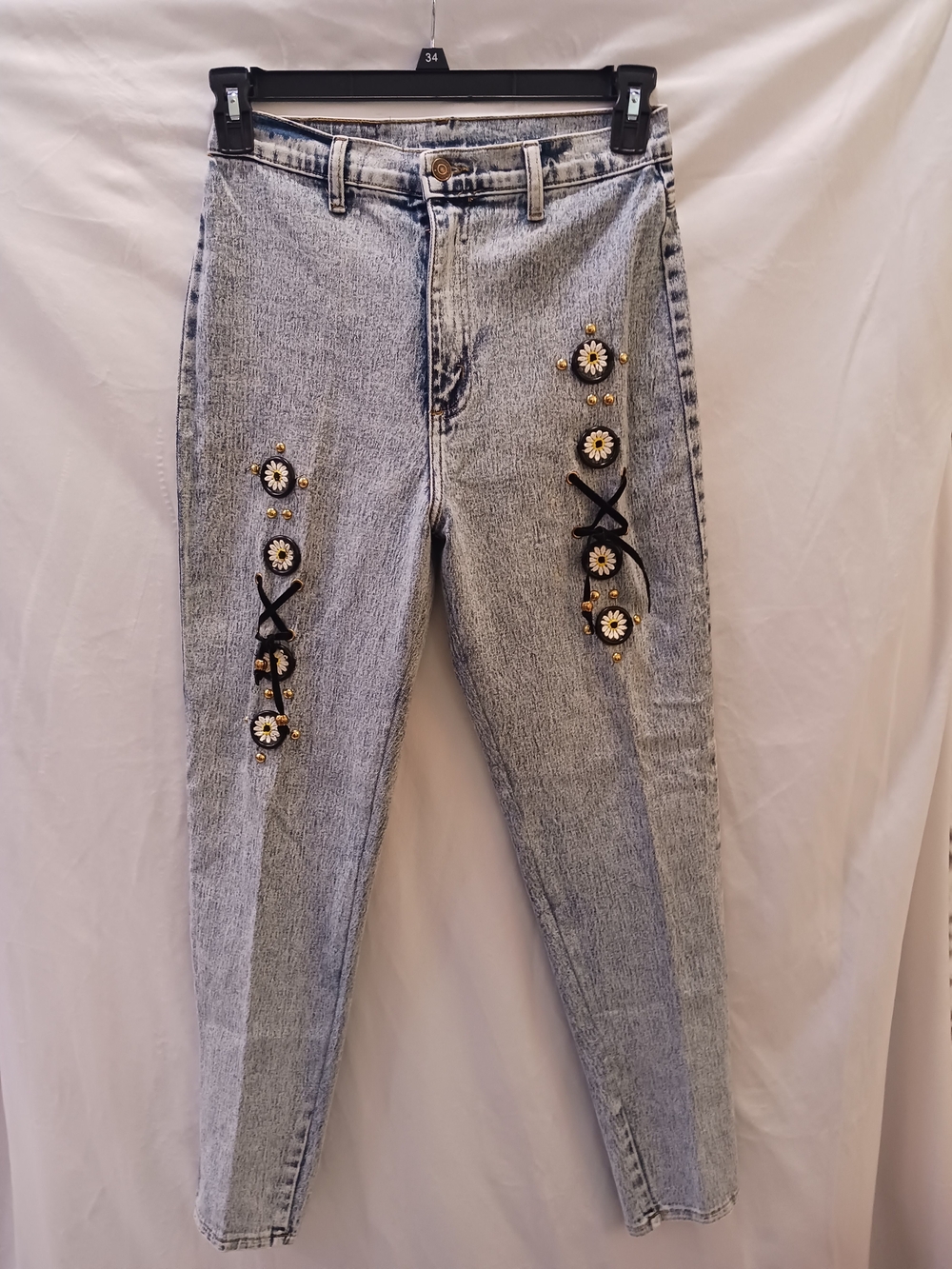 High-Rise Light Blue Jeans with Daisy Embellishments